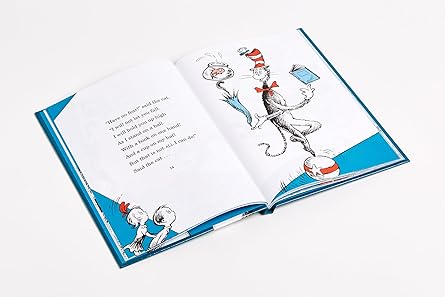 Open book with illustrations of characters from 'The Cat in the Hat' by Dr. Seuss on a white background.