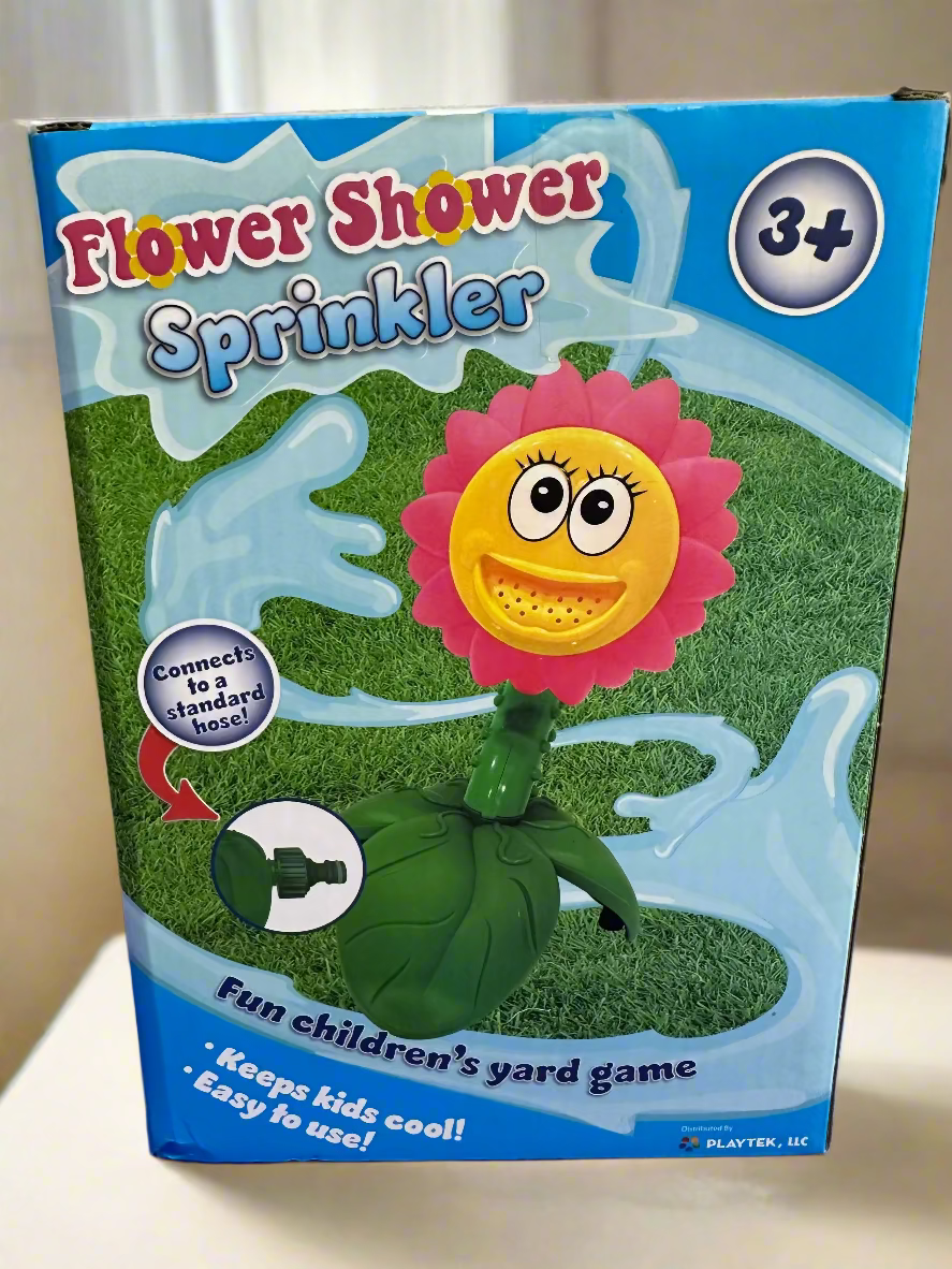 Box of Flower Shower Sprinkler with cartoon flower design on a blue background