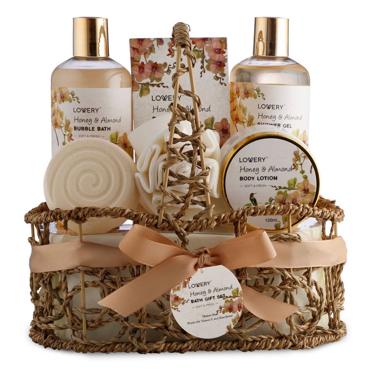 Bath gift set with various products in a woven basket on a white background