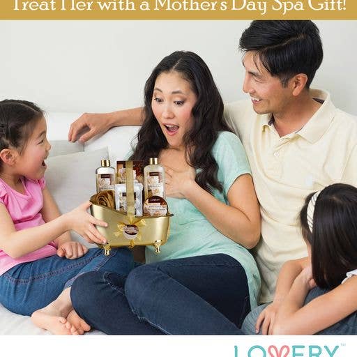 Family with a gift basket of products on a couch, promoting a Mother's Day spa gift.