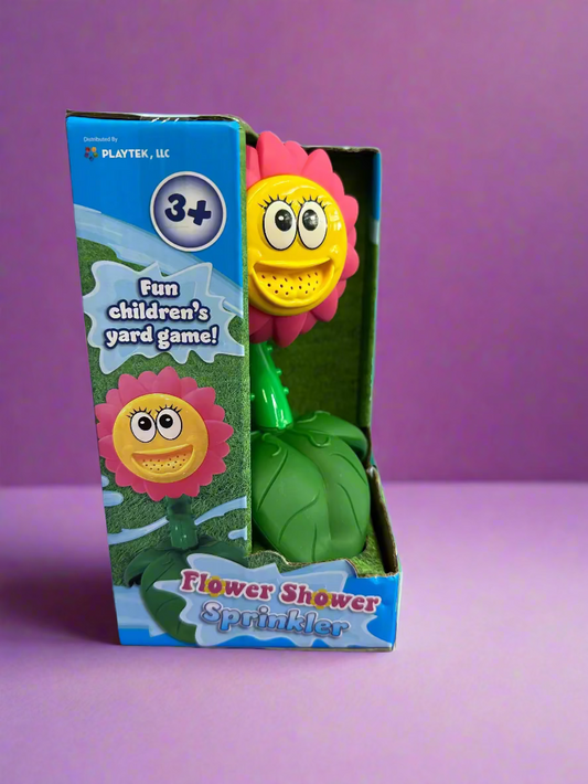 Flower Shower Sprinkler toy with packaging on a purple surface