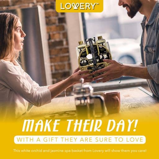 Two people exchanging a gift basket with 'LOVERY' branding, set against a blurred indoor background.