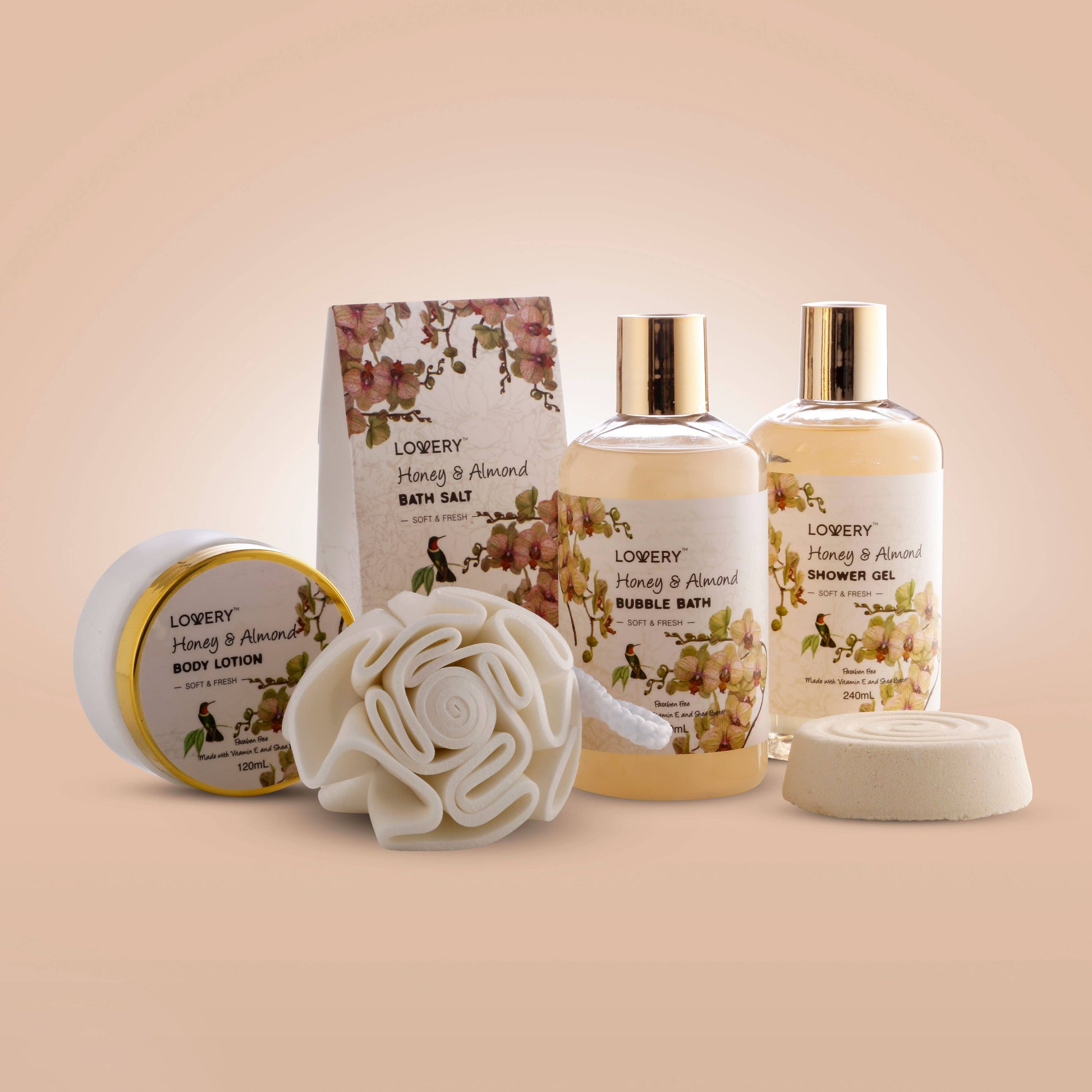 Collection of Lowery Honey & Almond skincare products on a beige background
